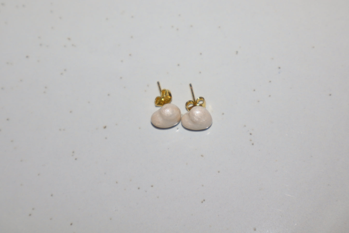 J. topo earring