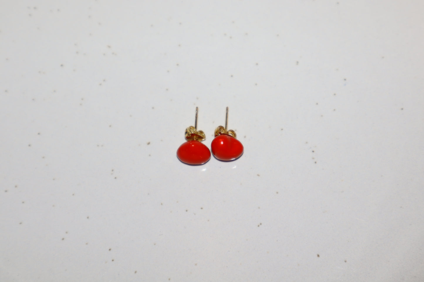 J. topo earring