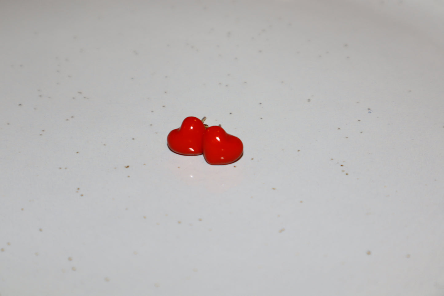 J. topo earring