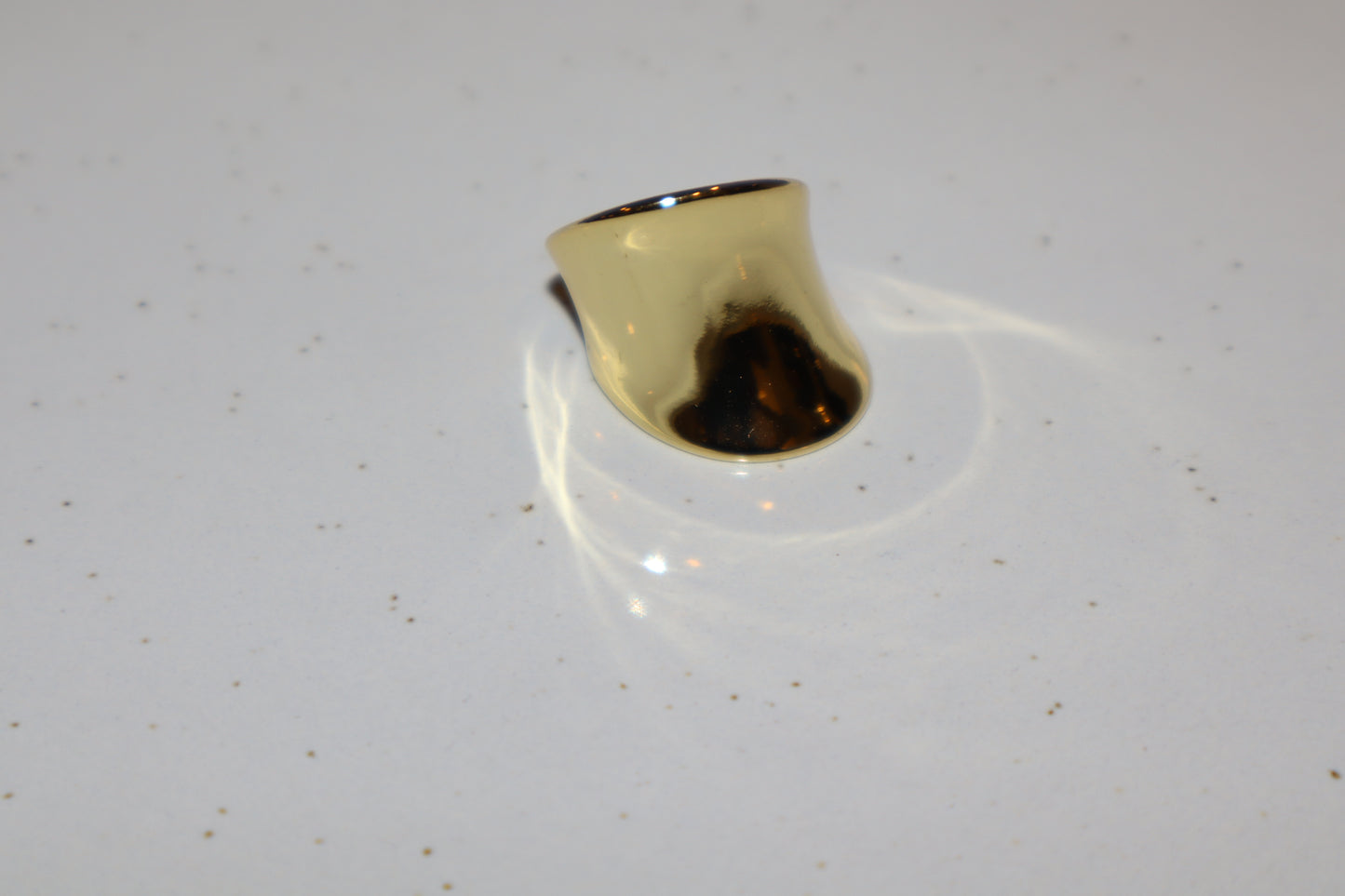 J.  Ella Rings