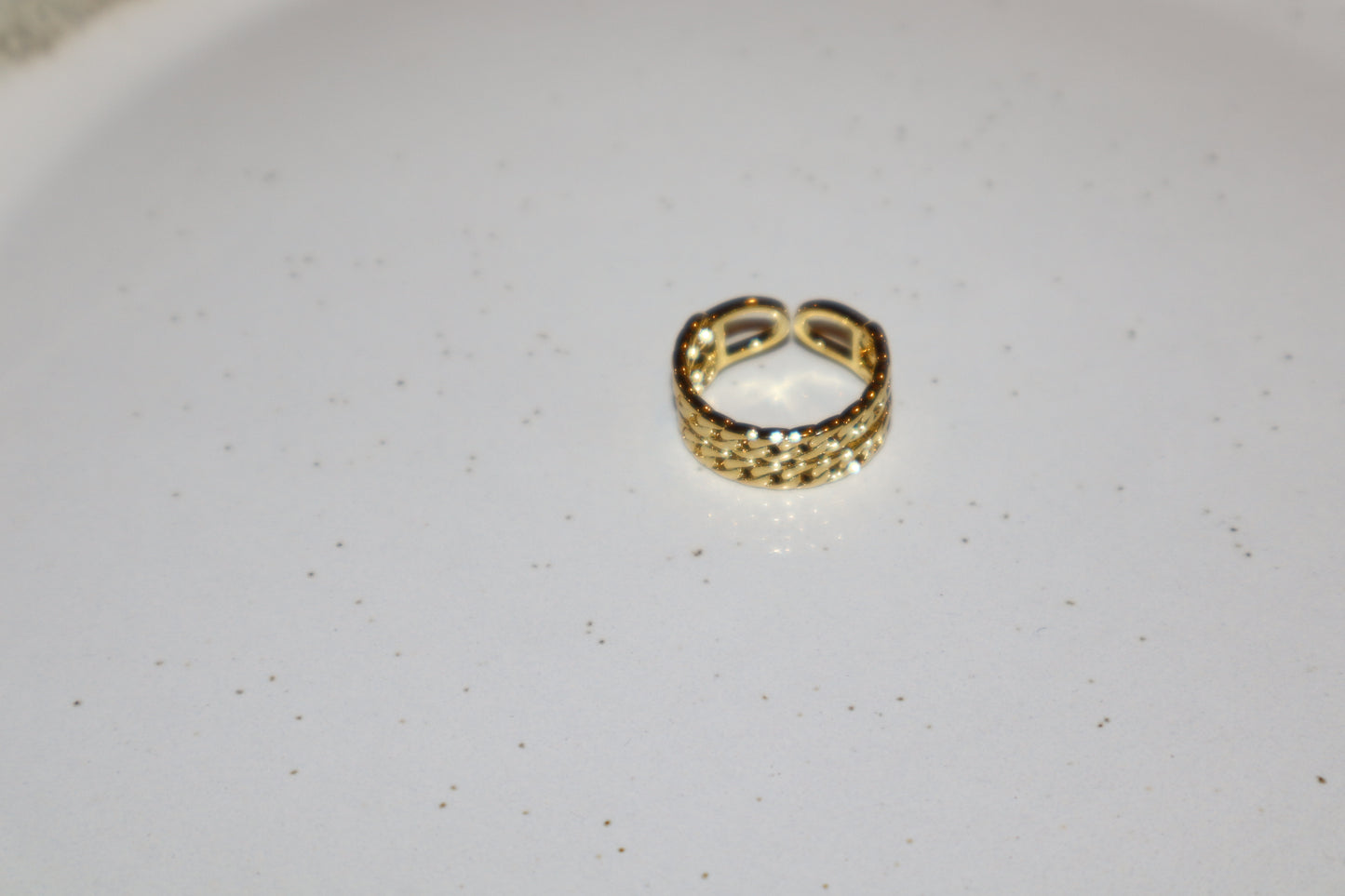 J.  Ella Rings