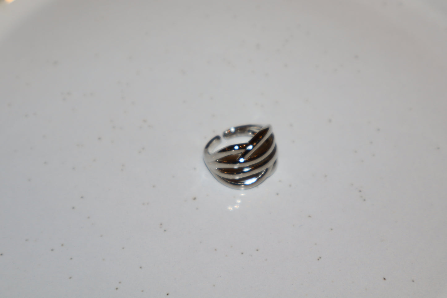 J.  Ella Rings