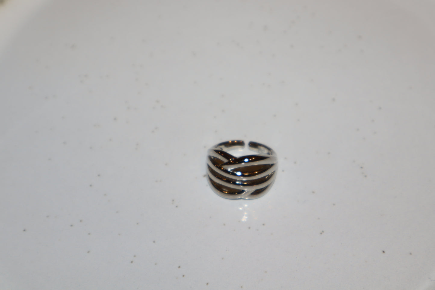 J.  Ella Rings