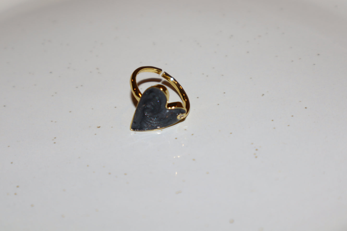 J.  Ella Rings