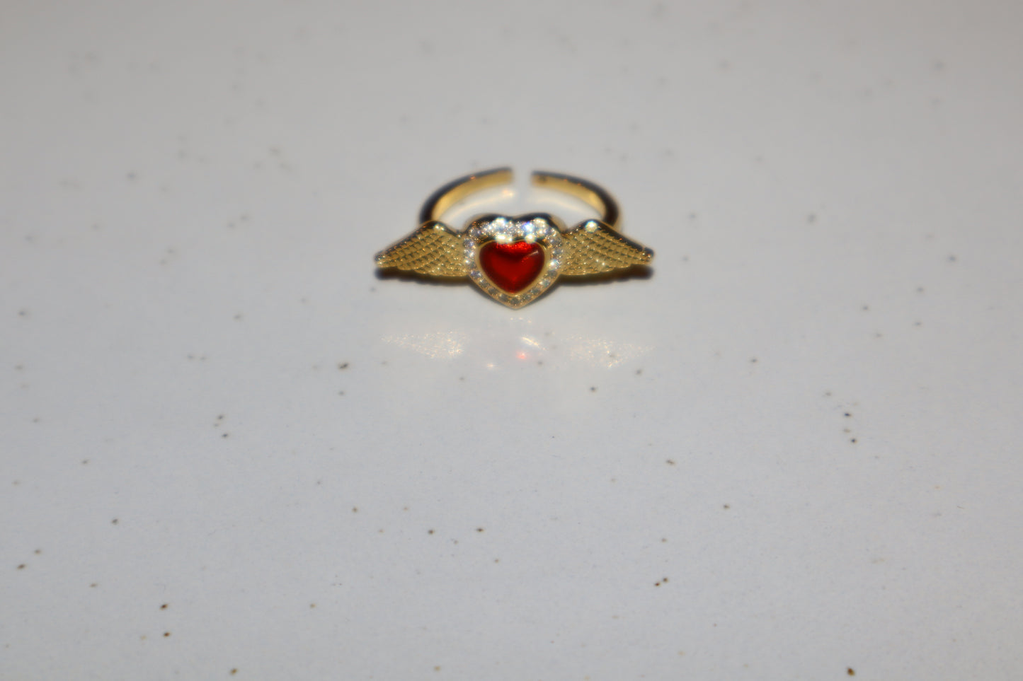 J.  Ella Rings