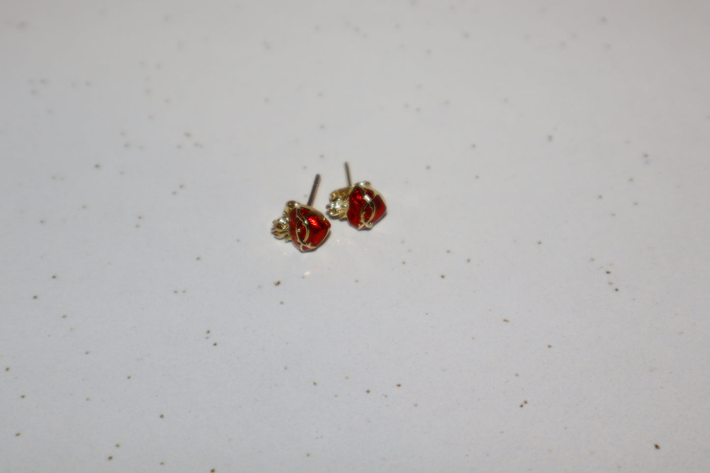 J.  topo earring