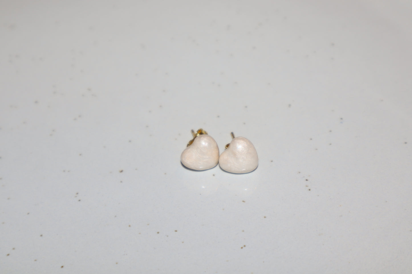 J.  topo earring