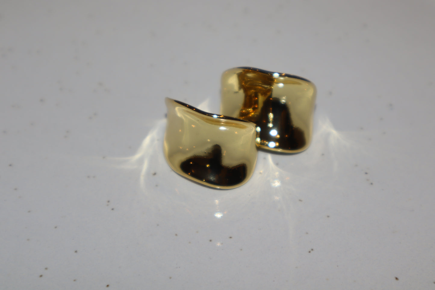 J.  Earrings