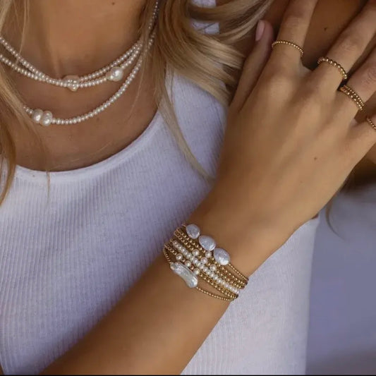 J.   Designer Bracelets